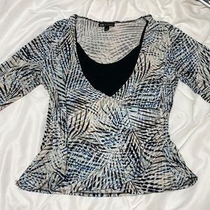 Soft and comfortable blouse with an attached under shirt